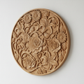 Floral carved wooden wall art with intricate flower patterns on white wall